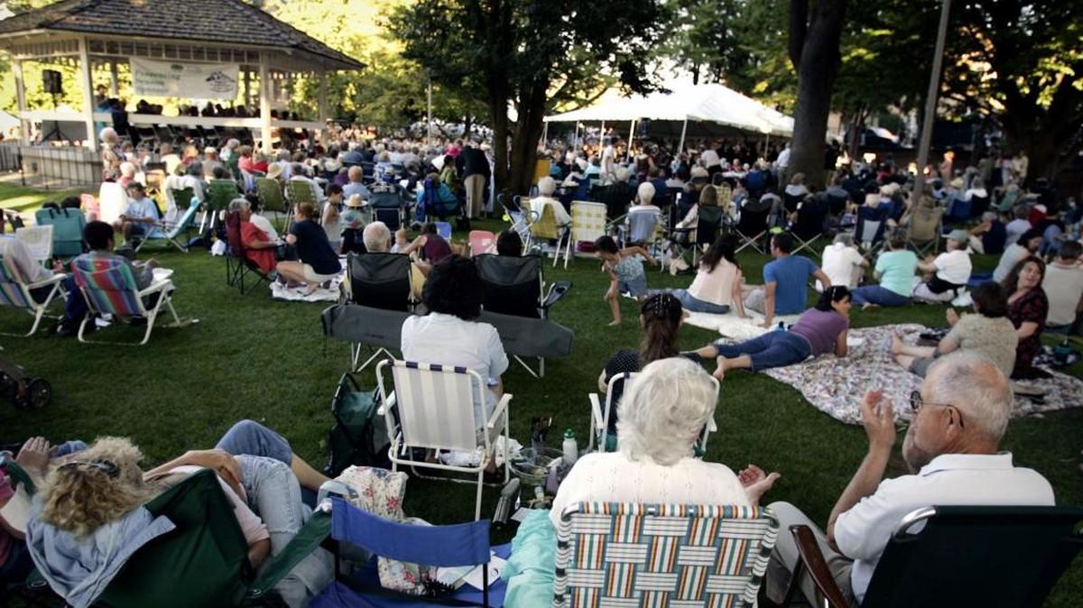 A large crowd fills Sylvester Park in July 2008 during a performance of Music in the Park.
