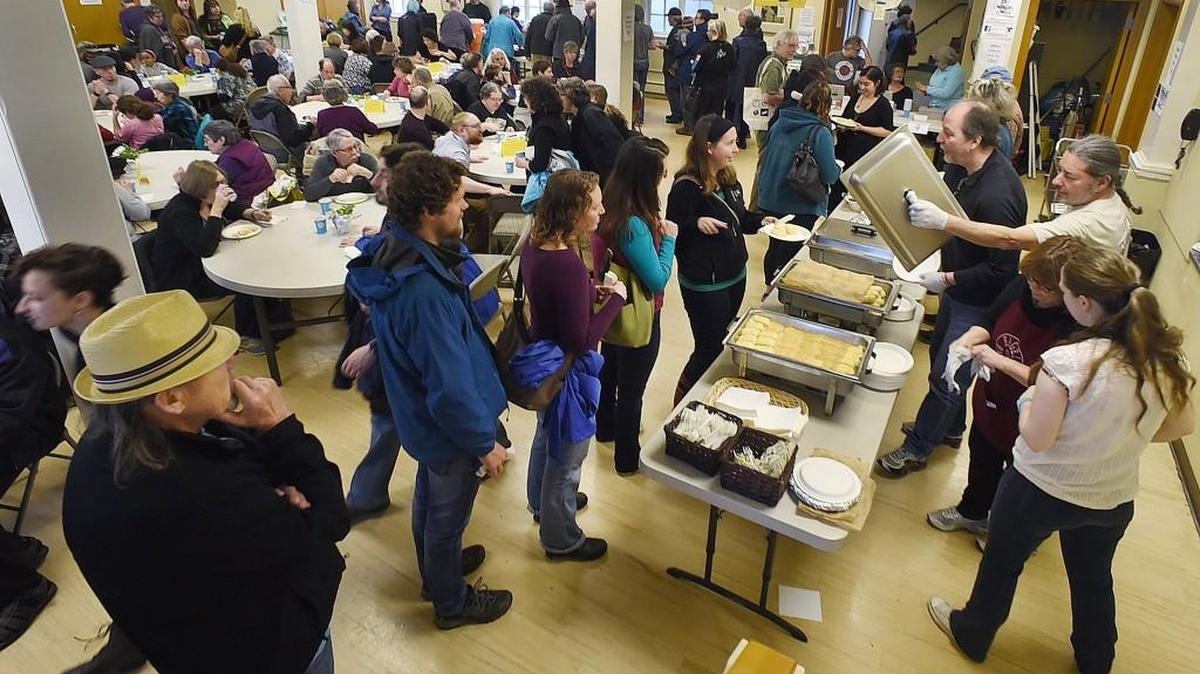 A seemingly never-ending line of blintz lovers files past the serving tables Sunday during the Blintzapalooza 2016 fundraiser at Temple Beth Hatfiloh in Olympia.