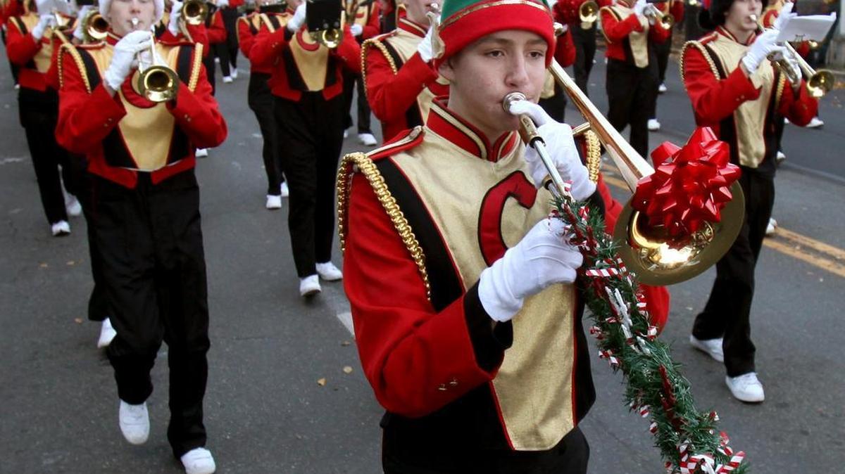 
FILE: The Capital High School marching band performs in a past Downtown for the Holidays parade.
