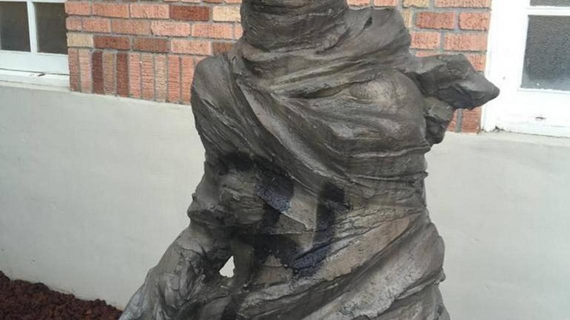 This statue outside Olympia’s Temple Beth Hatfiloh was vandalized with a spray-painted swastika in December 2015.
