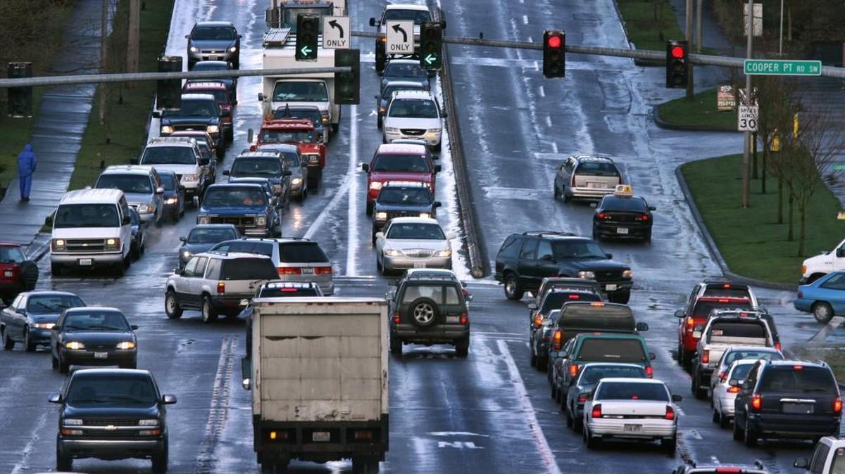 Traffic rolls through the intersection at Black Lake Boulevard and Cooper Point Road. (Tony Overman/The Olympian)