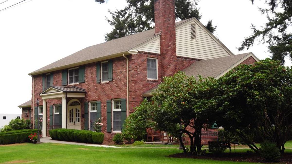 The Fisher House Foundation in 1992 opened this seven-suite home on Joint Base Lewis-McChord to provide a space for military families receiving urgent treatment at Madigan Army Medical Center. The foundation on Tuesday unveiled a second, 12-suite home on JBLM.