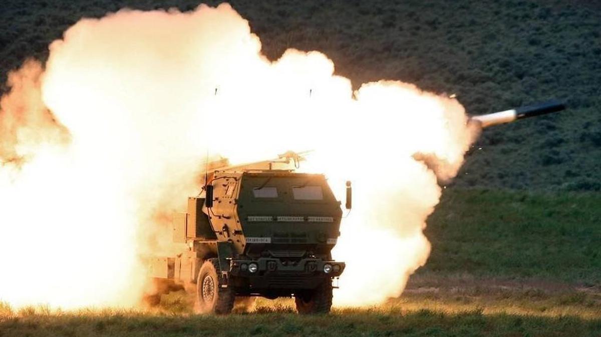 Staff file, 2011: Flames engulf the launch truck as soldiers fire the High Mobility Artillery Rocket System (HiMARS) during combat training in May 2011 in the high desert of the Yakima Training Center.