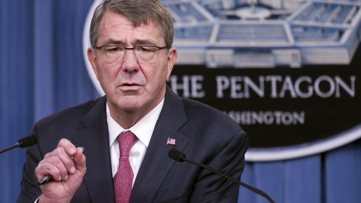 Defense Secretary Ash Carter gestures during a Thursday news conference at the Pentagon, where he announced he has ordered the military to open all combat jobs to women, and is giving the armed services until Jan. 1 to submit plans to make the historic change.