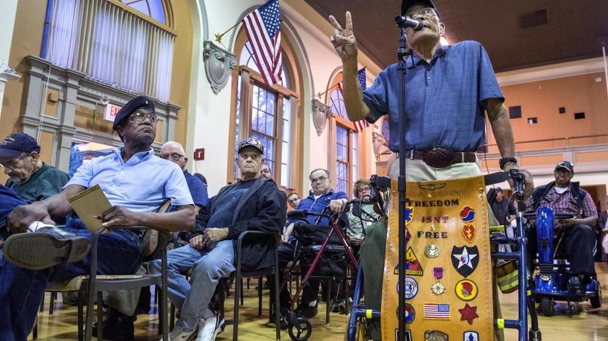 
Tacoma resident Dwight Obado, a 30-year Army veteran, discussed the difficulties he had receiving treatment for dental and mental health issues with a panel of VA Puget Sound leaders during a town hall forum at the American Lake VA Campus auditorium in Lakewood on Tuesday, Sept. 16, 2014.
