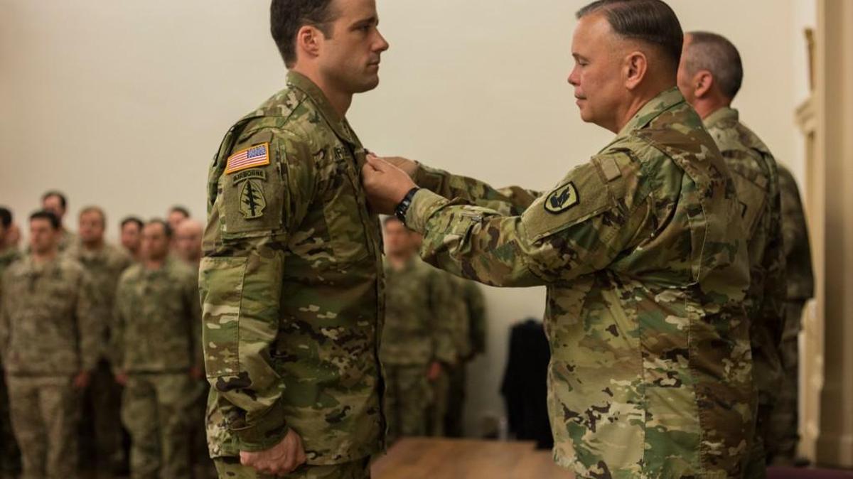 Staff Sgt. Michael Sargent receives a Silver Star during an award ceremony April 29 in Tacoma. Sargent distinguished himself by exposing himself without hesitation to enemy fire to secure a fallen Afghan commando and recover a fallen soldier in Afghanistan on Dec.17, 2015.