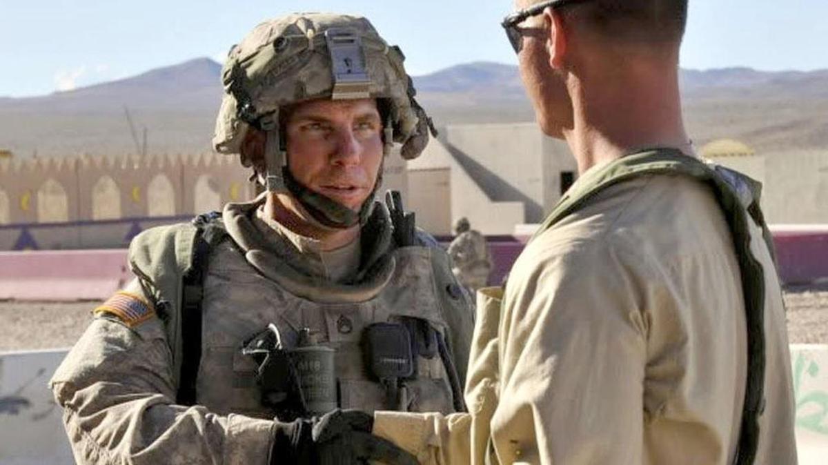 
Staff Sgt. Robert Bales, left, used his last stateside training before an Afghanistan deployment to practice interactions with Afghan villagers. He’s shown here in an August 2011 exercise at the National Training Center in California preparing for his last combat tour
