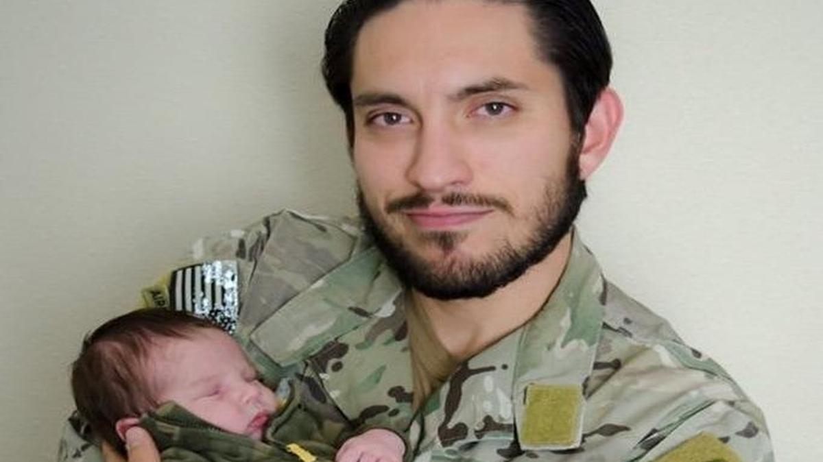 Staff Sgt. Matthew McClintock and his son.