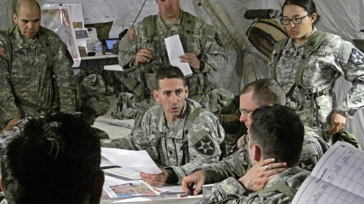Army mobile headquarters often are a mix of high-tech computing and old-fashioned work with maps. In 2016, the Pentagon wants the Army to install Windows 10 on all of its tech hardware.