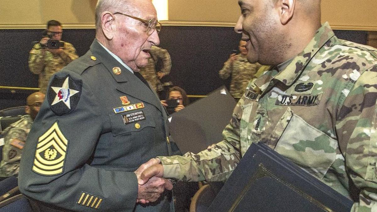 I Corps Command Sgt. Maj. James Norman (right) greeted retired Command Sgt. Maj. Jim Steinthal Friday at Joint Base Lewis-McChord’s salute to Korean War veterans. Steinthal fought in the war as a private first class but rose in rank to become the senior enlisted soldier in an artillery regiment.