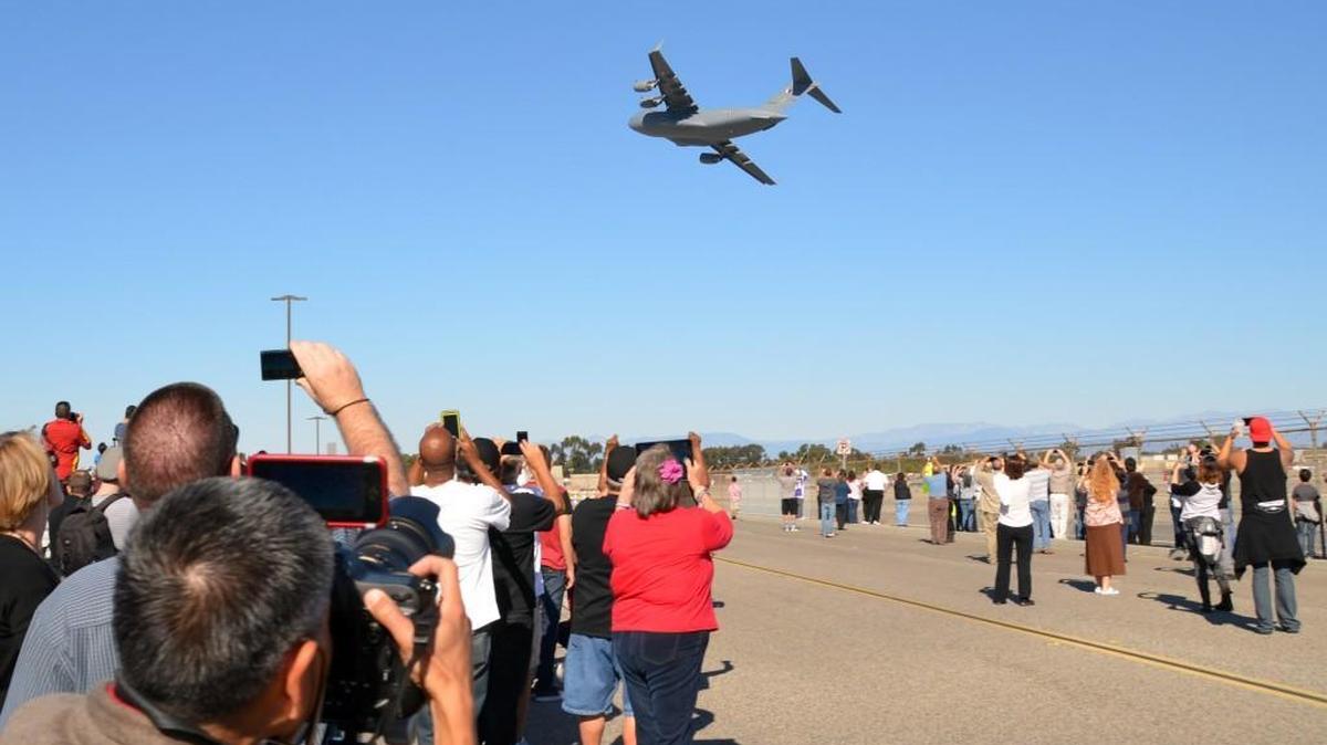 In this photo provided by Boeing, a C-17 Globemaster III takes off and makes a commemorative flyover at Boeing's Long Beach, Calif., facility Sunday, Nov. 29, 2015. The Long Beach facility assembled more than 250 C-17s over two decades, but two years ago Boeing announced that it didn't have enough foreign orders to justify keeping the plant open.
