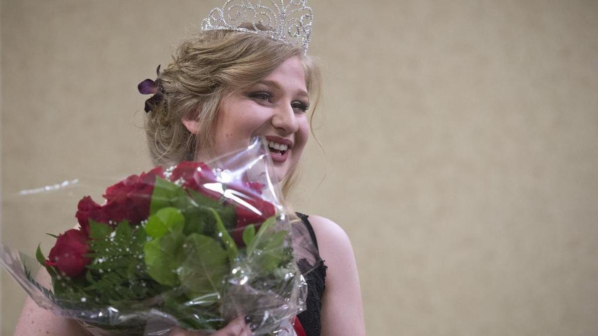 Jackie DeShaye of Olympia High School is crowned Queen of Capital Lakefair on Saturday during the coronation pageant at the Red Lion Hotel in Olympia.