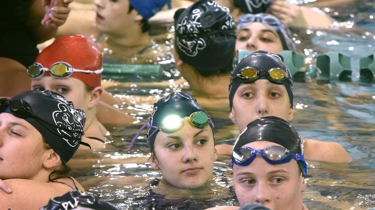 Olympia High swimmers crowd the pool at The Evergreen State College in Olympia during swim practice on Wednesday, Oct. 7, 2015.