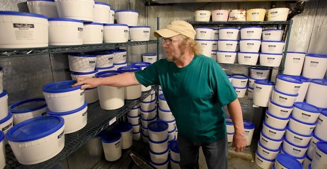 Karl Black, who opened Olympic Mountain Ice Cream with his wife Bev in the 1980s, showed The Olympian its then-new freezer in 2017.