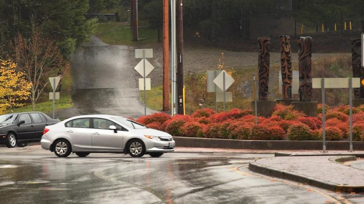 Log Cabin Road, now a short stretch between Cain and Boulevard roads, will eventually be extended through LBA Woods to Wiggins Road, under current city plans. Shown here is the roundabout at Log Cabin and Boulevard.