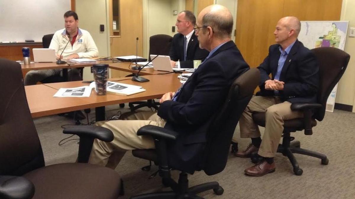 From left: Lacey Mayor Andy Ryder, City Manager Scott Spence, Water Resources Manager Peter Brooks and Public Works Director Scott Egger discuss the city’s septic-to-sewer conversion process during Thursday’s City Council work session.