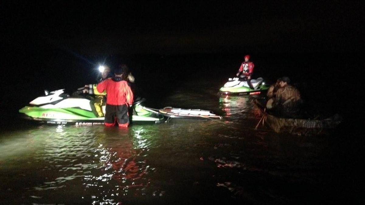 Fire crews rescued four boaters and a dog Saturday morning near Luhr Beach.