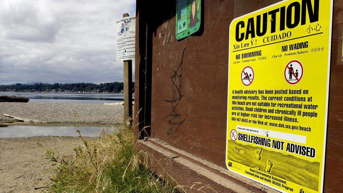 A sign at the beach at Burfoot County Park in 2014 advises visitors not to swim or wade in the water due to elevated bacteria levels. In 2017, the beach had "excellent water quality," according to the state's Department of Ecology.
