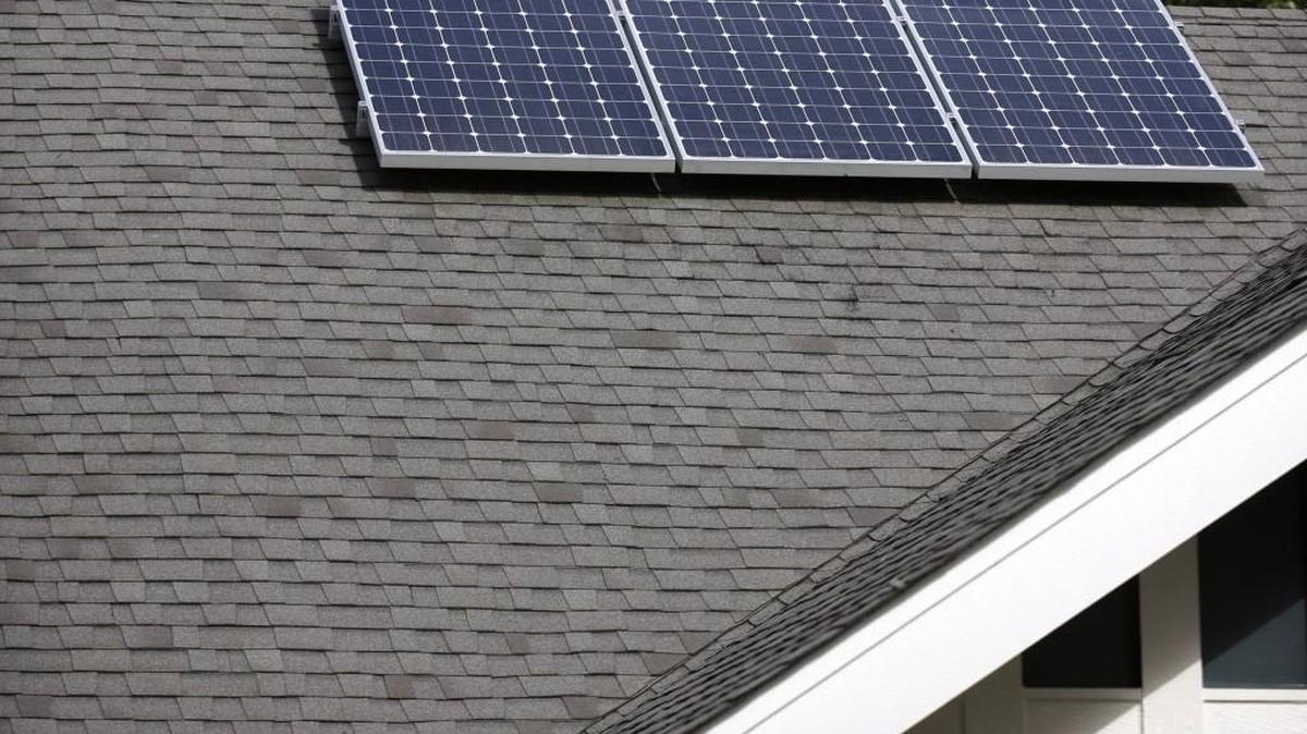 
The small 700-watt “starter system” of solar panels on the roof of Cheryl Bayle’s net-zero energy designed home in Olympia includes the infrastructure for easy expansion, said home builder Scott Bergford of Scott Homes. The new 2,020-square-foot home was shown during the Thurston Solar Tour in 2012.
