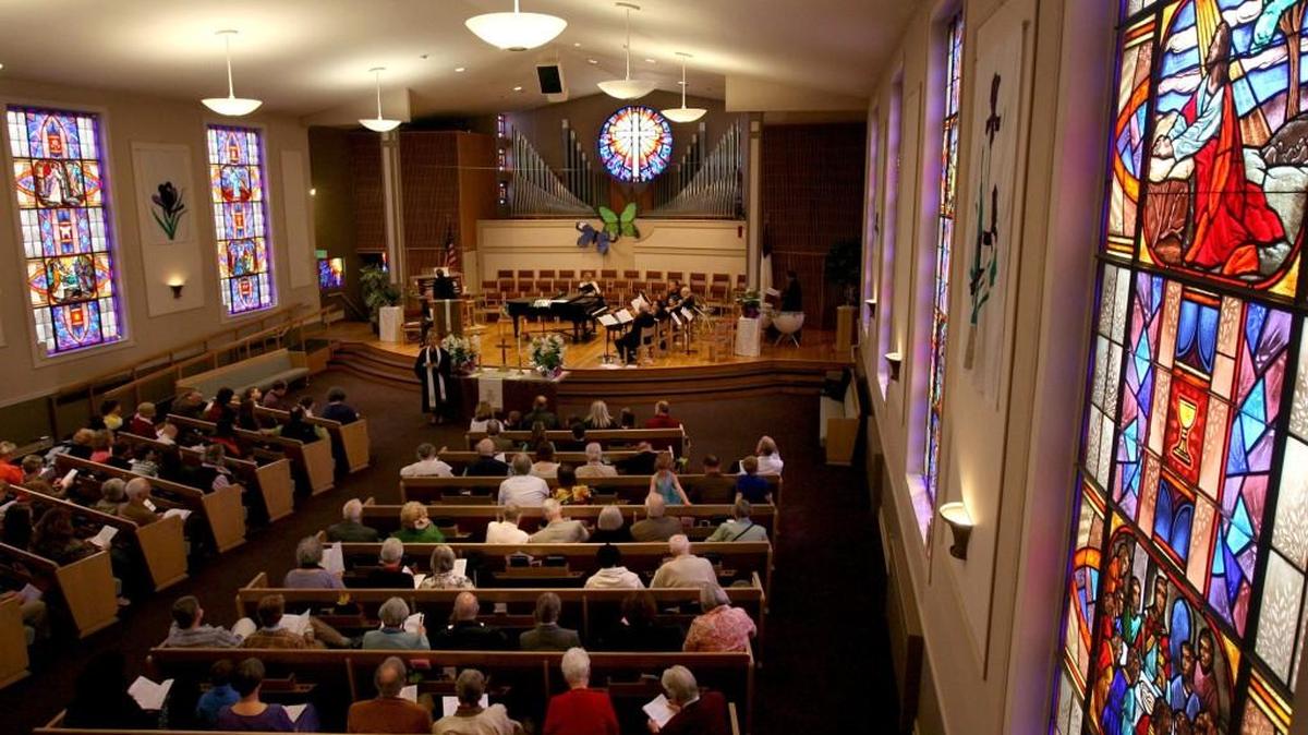 In a 2011 file photo, Rev. Dr. Tammy Stampfli welcomes the congregation at the United Churches of Olympia for its annual Easter Services Sunday morning,later delivering her holiday sermon which dealt with the topic of fear and how to free oneself of its lingering affects.The Easter Festival Celebration in Lessons and Song included Rev. Stampfli's message of Christ's Resurrection along with traditional and modern inspirational songs and choral music.