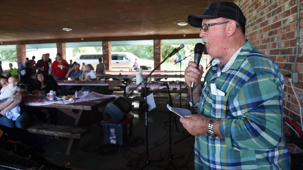 
One of the organizers for the annual Thurston-Mason-Lewis Central Labor Council’s annual Labor Day picnic, Bob Guenther, announces raffle prize winners Monday afternoon at Stan Hedwall Park in Chehalis. A union leader for years, Guenther is heartened by what he sees as renewed interest in labor movement issues by younger workers.
