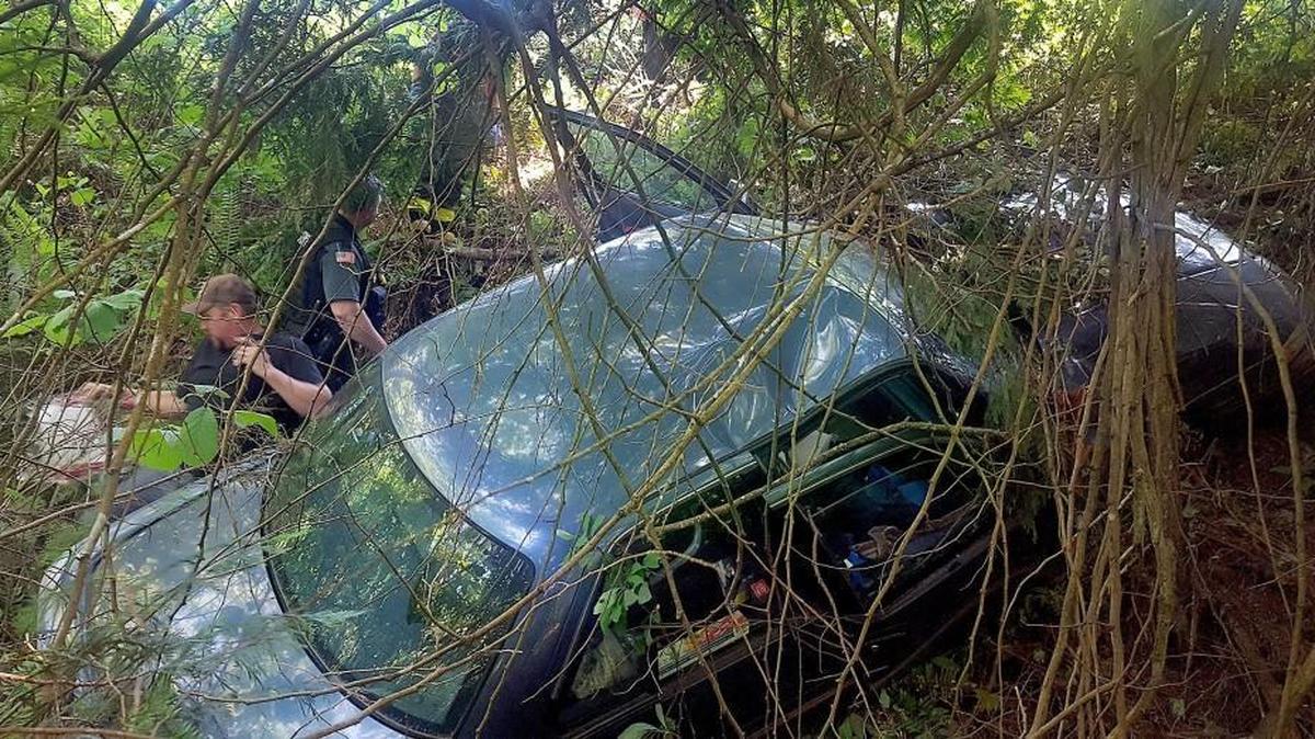 Crews rescue Sharon Lee Leaming, 70, who was entrapped in a car that went off a 30-foot embankment for five days on Sunday, May 28.