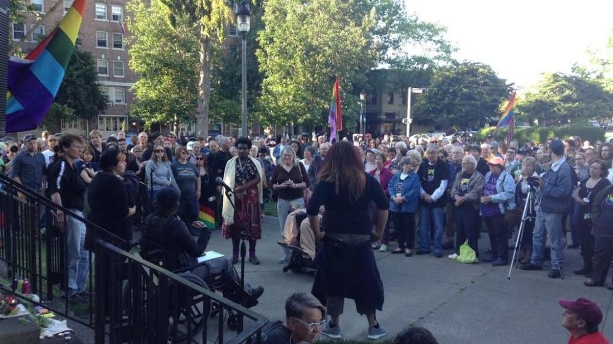 Hundreds attended a vigil Sunday night at Sylvester Park in Olympia after the mass shooting at a gay nightclub that took 50 lives in Orlando, Florida.