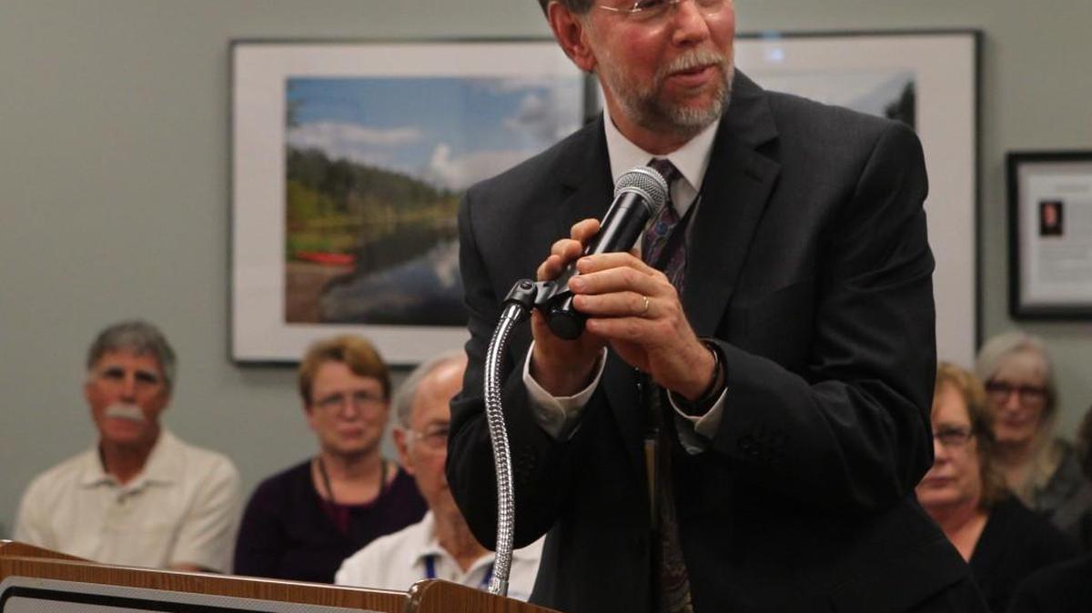 Olympian file photo: Thurston County manager Cliff Moore talks during a farewell presentation for County’s Health Officer on Nov. 12, 2013. Moore has been offered the job of Yakima city manager.