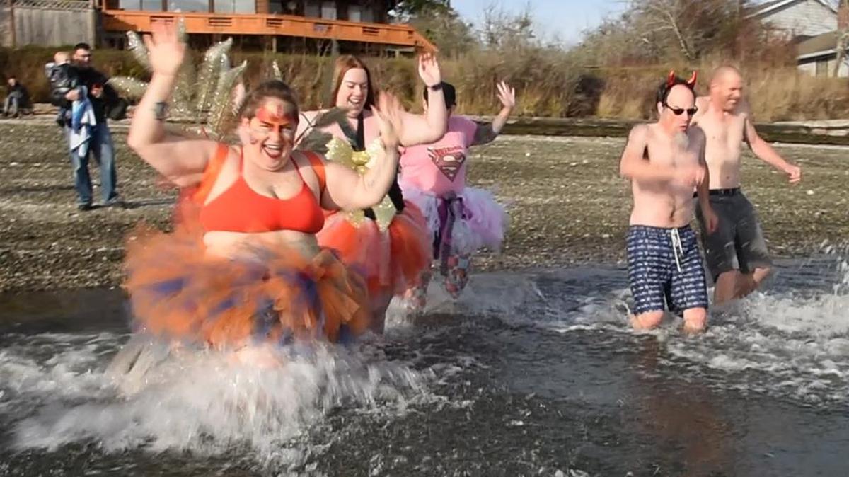 A 37-degree Pickering Passage water temperature didn't deter about 20 hearty New Year's revelers from participating in the 10th annual Squaxin Community Salish Sea Plunge off of the Arcadia Boat Ramp in Mason County last year.