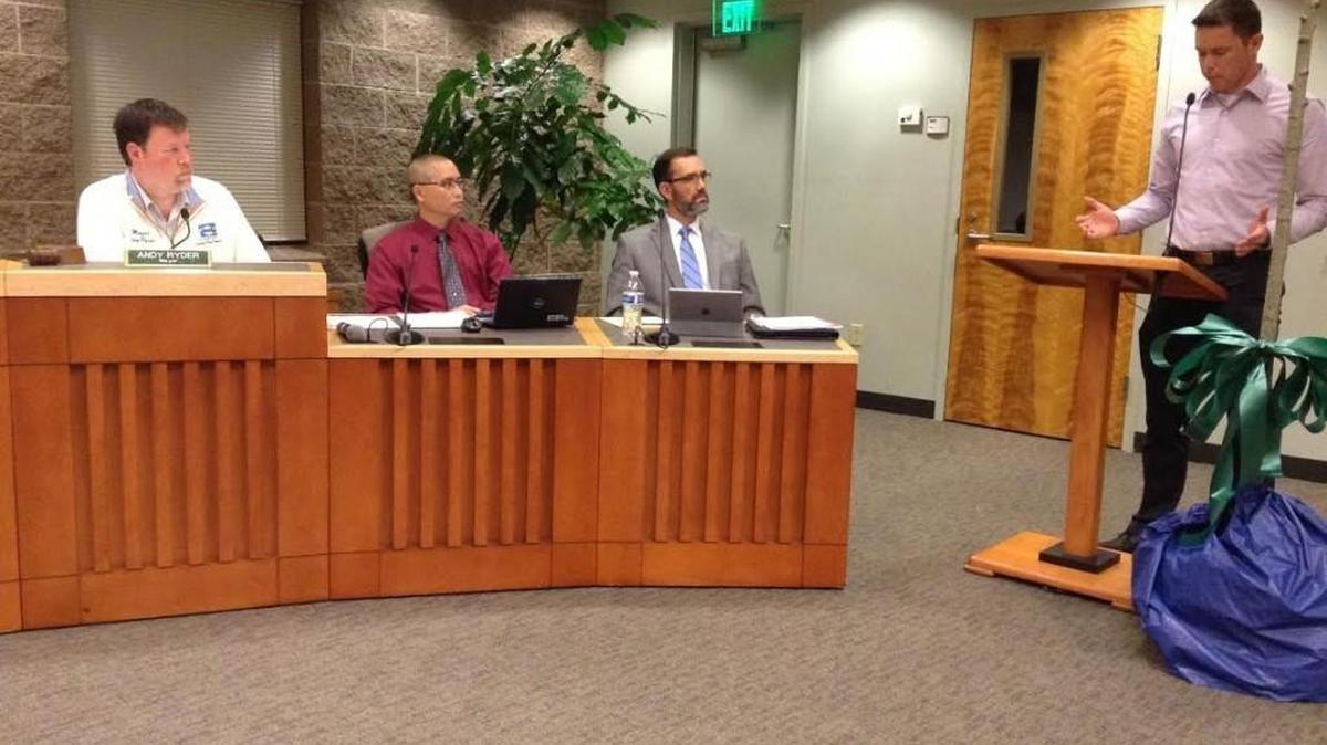 Lacey resident and avid cyclist Vaughn Nelson (far right) testifies in support of bike lanes on College Street Southeast during Thursday night’s Lacey City Council meeting.