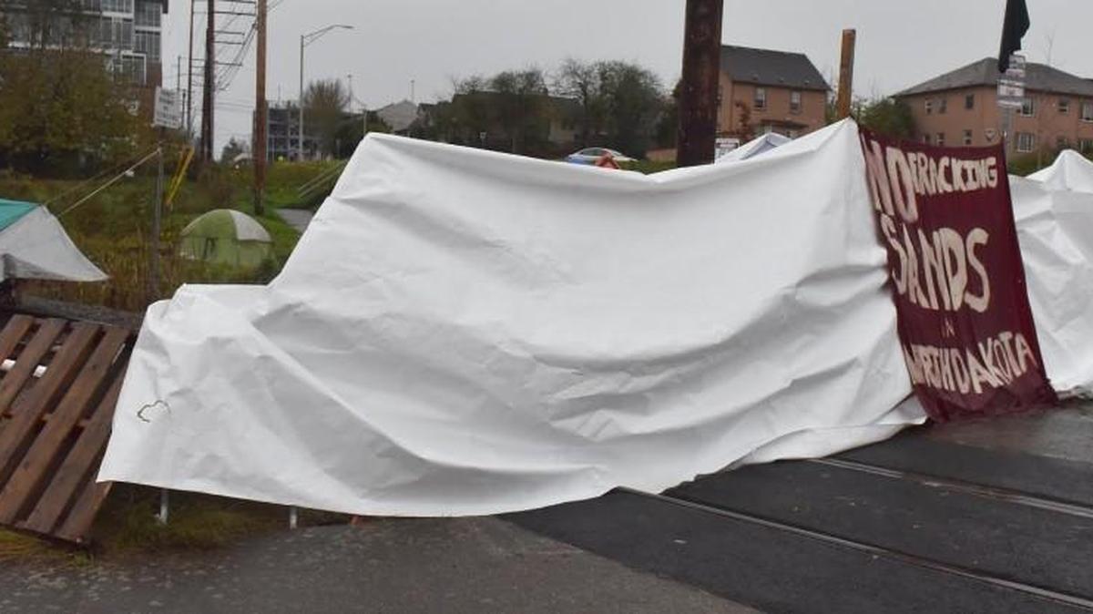 Protesters against fracking in North Dakota have set up an encampment blocking the rail line from the Port of Olympia on Seventh Avenue and Jefferson Street Southeast.