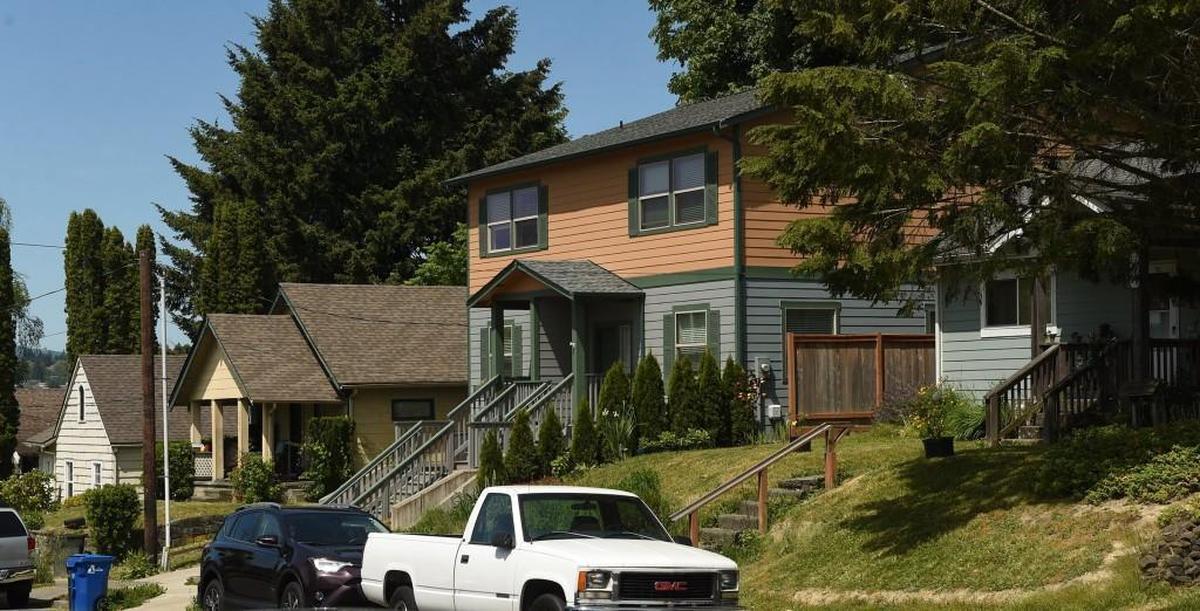 A mixture of multi-family and single-family houses on Fifth Avenue Southeast in Olympia. The City Council on Monday approved changes that will allow more multi-family housing in the city’s low-density neighborhoods.