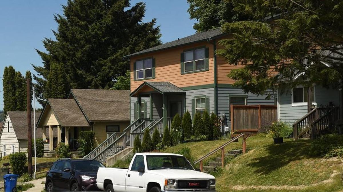 A mixture of multi-family and single-family houses on Fifth Avenue Southeast in Olympia. The City Council on Monday approved changes that will allow more multi-family housing in the city’s low-density neighborhoods.