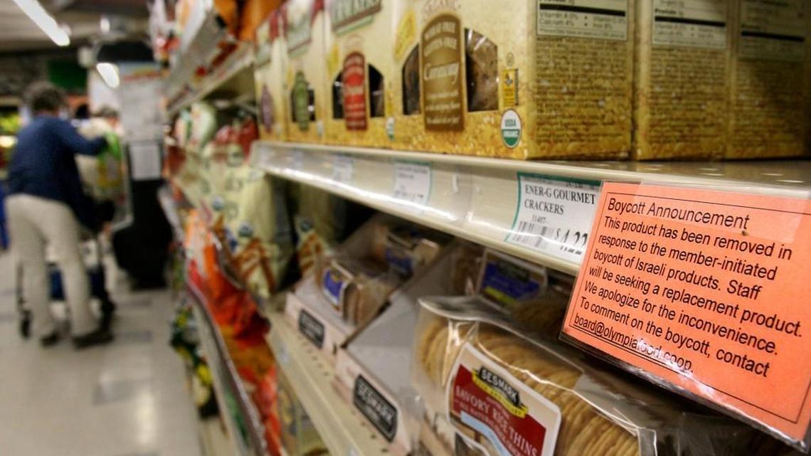 A sign tells Olympia Food Co-op shoppers about the co-op board’s decision to boycott Israeli goods starting in 2010.