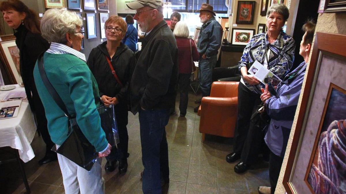 Crowds fill Vue Vision Uniquely Experienced during 2014 Spring Arts Walk in downtown Olympia14.