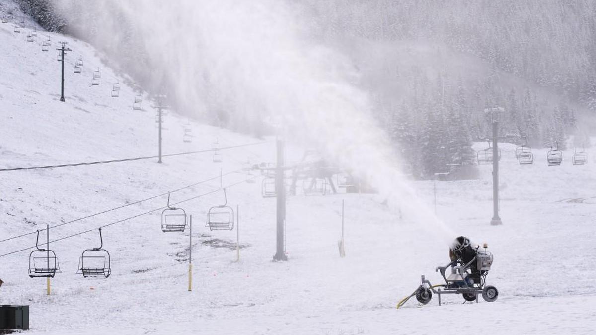 A snow-making machine blows out snow at the ski area for the upcoming season at Crystal Mountain Resort on Wednesday. John Kircher, Crystal Mountain Resort general manager, hopes to open the ski season on the Thanksgiving weekend.