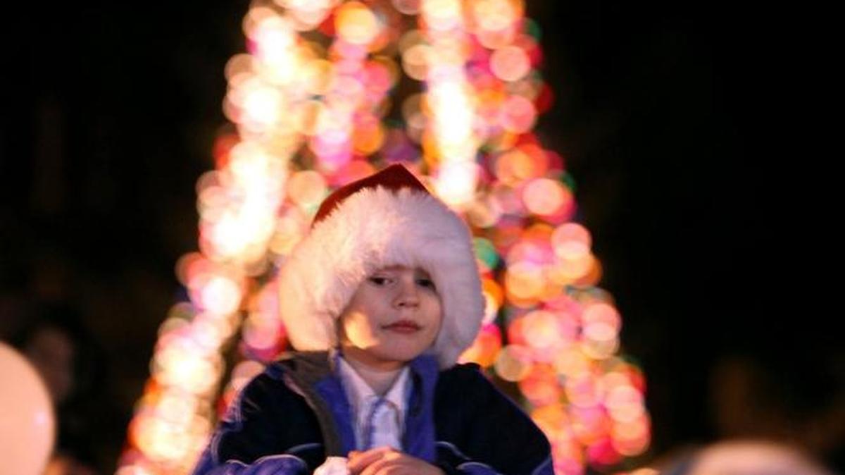 FILE PHOTO: Devin Stemple, 6, of Olympia, waits to see Santa during the City of Tumwater's annual Christmas tree lighting celebration in 2012.
