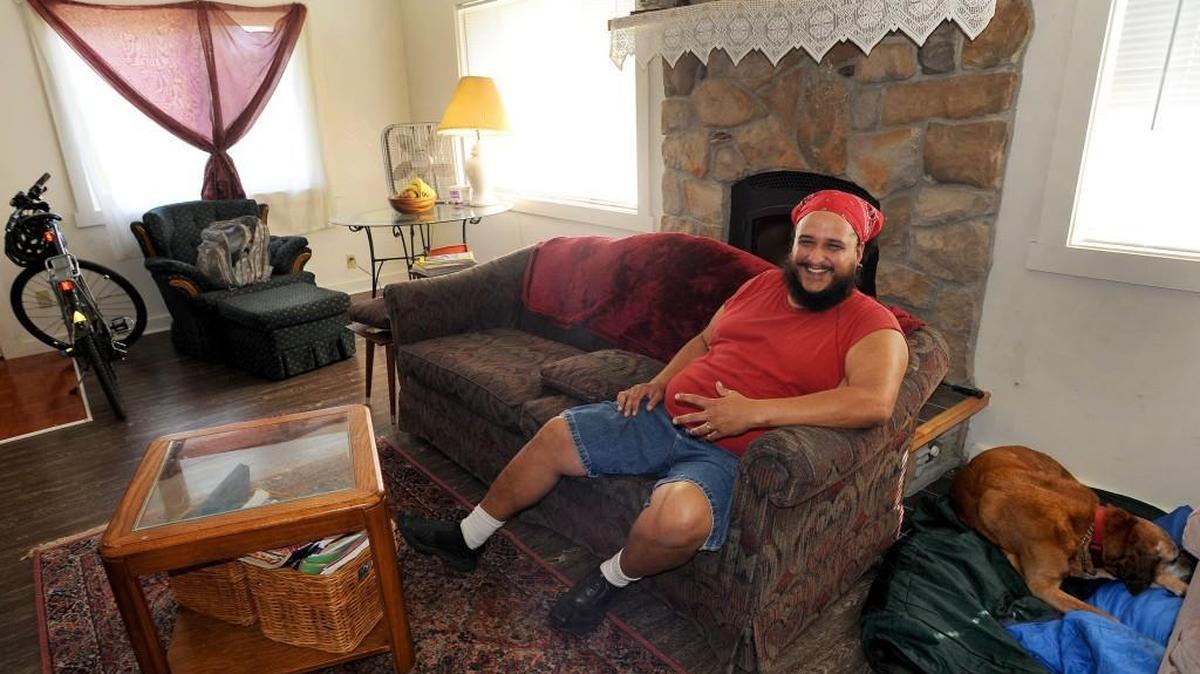 After living with his family in shelters and even in the forest. without a roof over their heads, David Gooze now has a place in Olympia to call home, along with full-time employment.