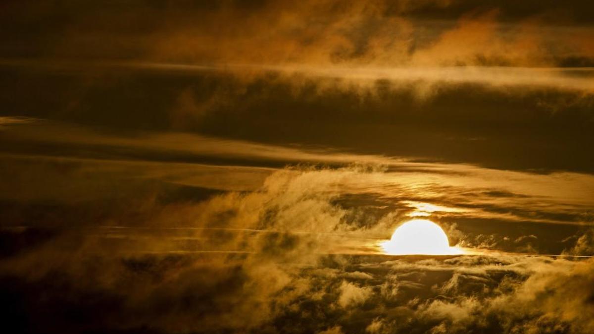 The sun rises over clouds and fog in Longbranch on Sunday. After months of rain, temperatures are expected to reach the low 70s Wednesday and Thursday.