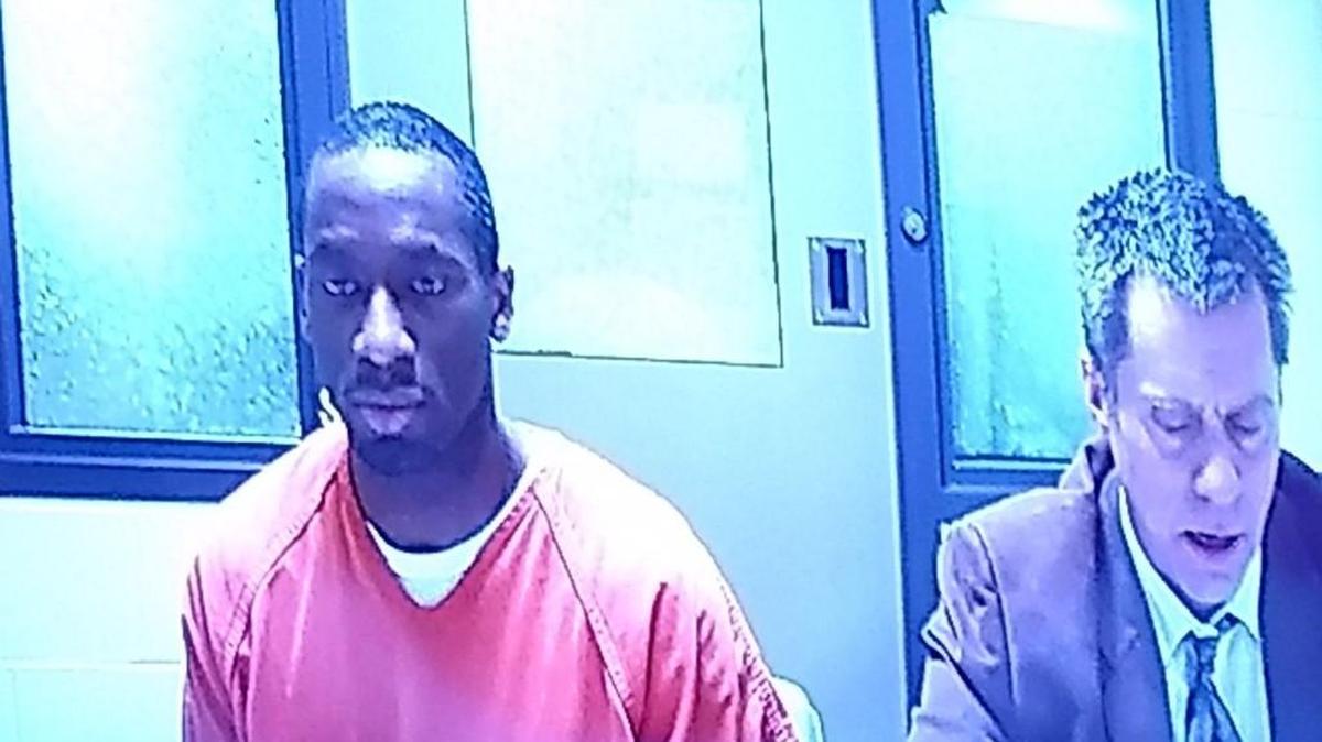 Curtis Rudolph, left, is charged with first-degree assault and second-degree unlawful possession of a firearm. He appeared via video conference in Thurston County Superior Court on Friday.