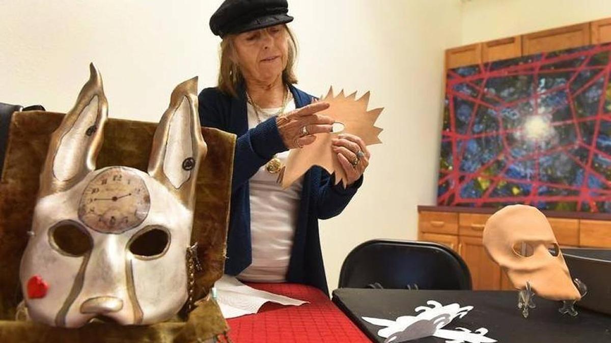 Artist Colleen Weston prepares to give a short workshop on her craft — leather mask design — to visitors at Gallery Boom on in downtown Olympia during Fall Arts Walk 2016. Arts Walk is Friday and Saturday in Olympia.