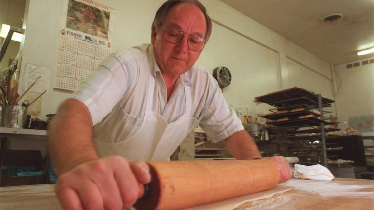 Rudy Wagner at work in 1998. The longtime owner of Wagner’s European Bakery in Olympia died last week.