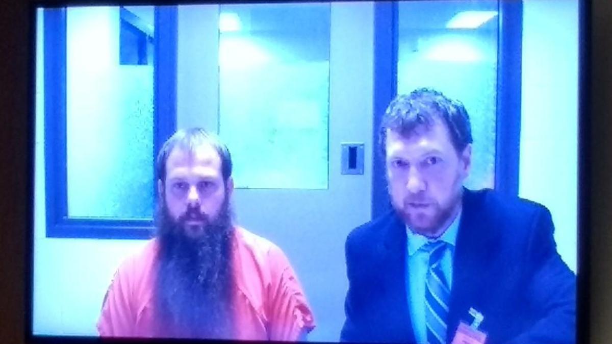 Samuel A. Everly (left) is accused of fatally striking a motorcyclist with his truck Saturday night near Rainier. He appeared in Thurston County Superior Court on Oct. 30, 2017 with attorney Thomas Keehan.
