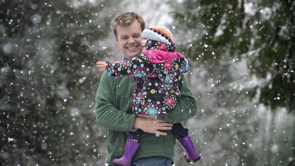Neil Hartman and his daughter, Aria, 2, play in a winter wonderland on Tumwater Hill Jan. 3.