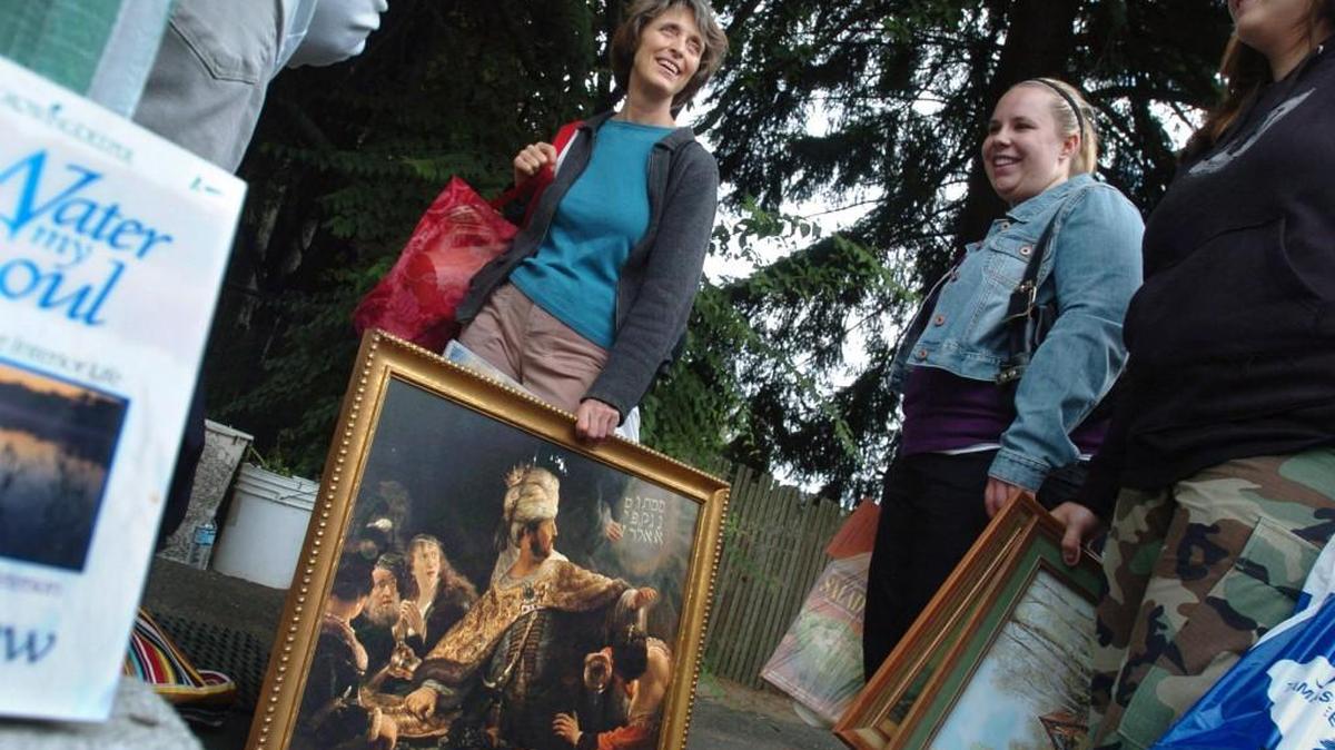FILE PHOTO: Customers wait in line to pay for purchases at the Patio Sale at Panorama in Lacey. The annual sale runs 9 a.m.-3:30 p.m. Saturday on the Panorama campus in Lacey. Follow the signs just past the intersection of 14th Avenue and Sleater-Kinney Road Southeast.