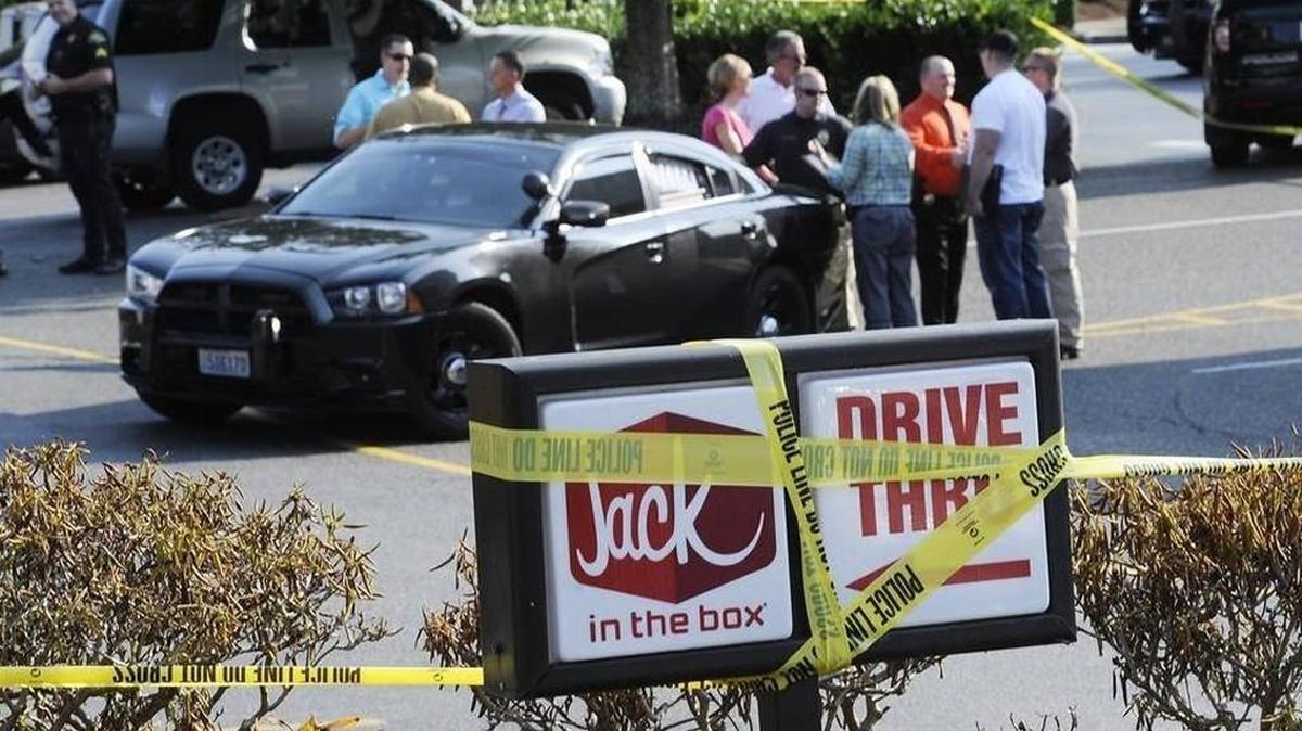 Police respond to reports of a man with a knife at the Tumwater Jack in the Box on Aug. 18, 2015.