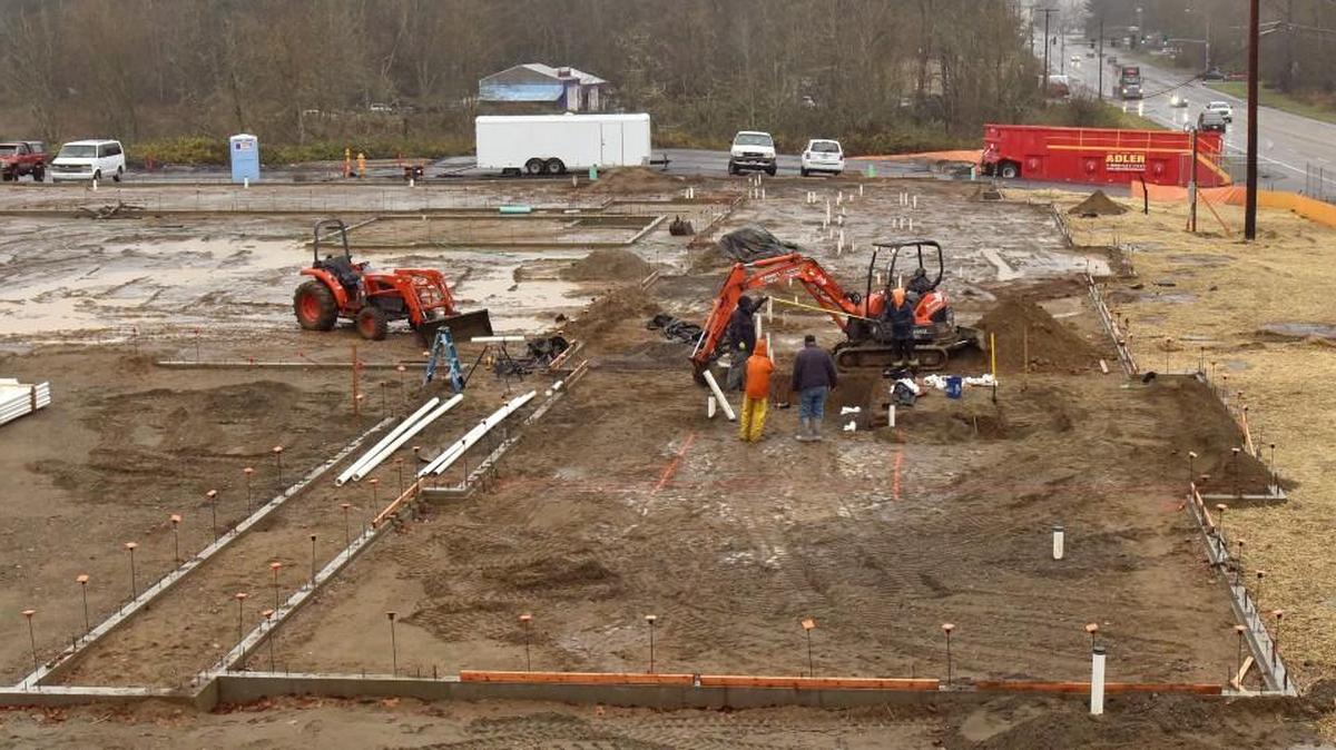The foundation begins to take shape Nov. 30 at Merritt Manor, an affordable housing project under construction on Martin Way in Olympia at the former site of the Bailey Motor Inn.