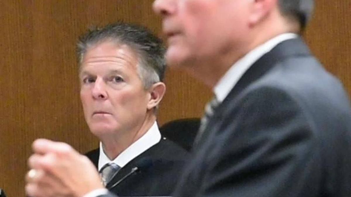 Thurston County Superior Court Judge James Dixon listens as defense attorney Richard Woodrow addresses the jury during opening statements on Jan. 8, 2018, in the sexual assault trial of Gregory A. Schirato.