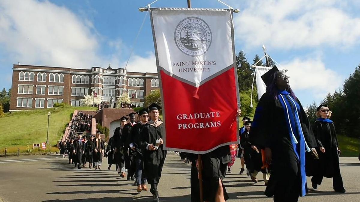 More than 300 graduates made the picturesque annual processional from the steps of the historic Old Main Building to Marcus Pavilion at Saint Martin's University's 2018 Commencement exercises in Lacey.