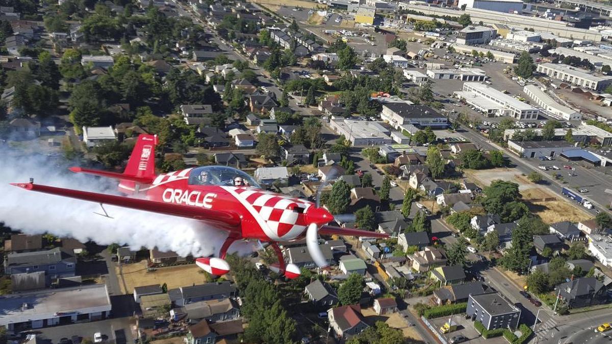 
Aerobatic pilot and Boeing Seafair Air Show performer Sean D. Tucker, left, and Edgewood resident Carson Lobdell, 15, fly as part of the Young Eagle program last week over Boeing Field in Seattle. Young Eagles is an international movement to introduce kids to flight.
